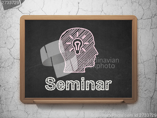 Image of Education concept: Head With Light Bulb and Seminar