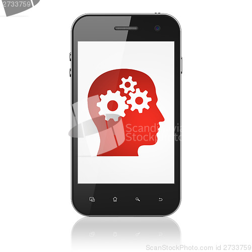 Image of Education concept: Head With Gears on smartphone