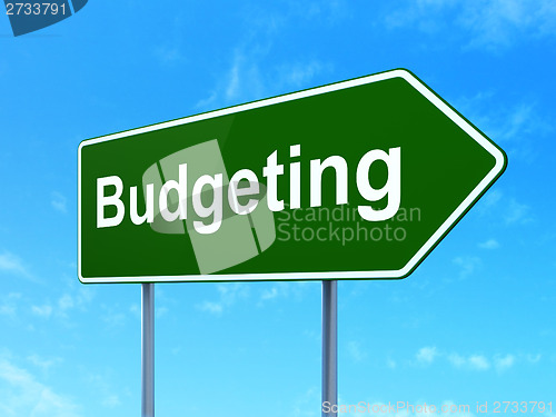 Image of Business concept: Budgeting on road sign background