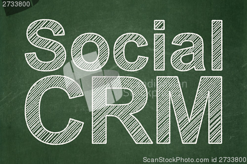 Image of Business concept: Social CRM on chalkboard background