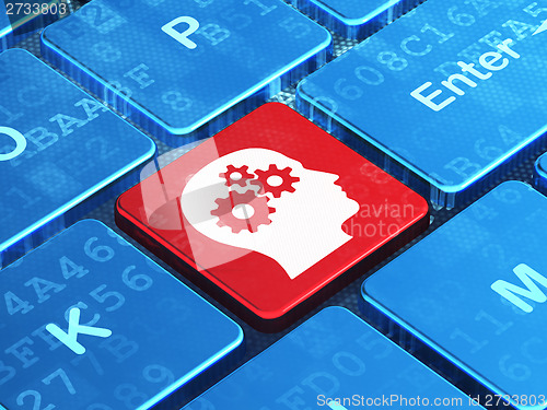 Image of Marketing concept: Head With Gears on computer keyboard