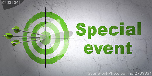 Image of Business concept: target and Special Event on wall background