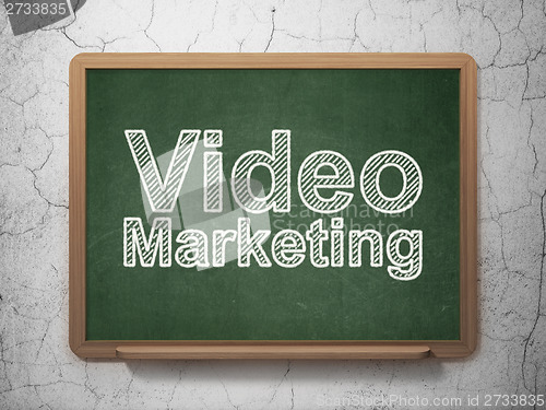 Image of Finance concept: Video Marketing on chalkboard background
