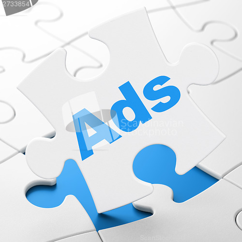 Image of Advertising concept: Ads on puzzle background