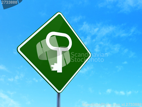 Image of Security concept: Key on road sign background