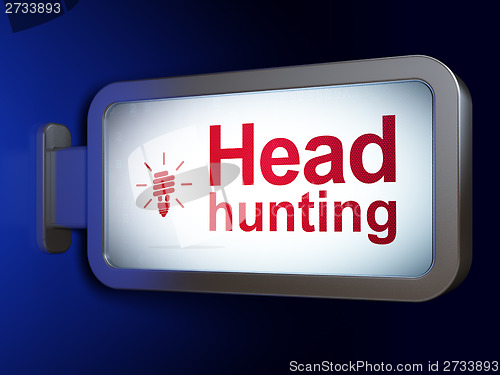 Image of Finance concept: Head Hunting and Energy Saving Lamp on billboard background