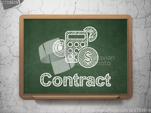 Image of Business concept: Calculator and Contract on chalkboard