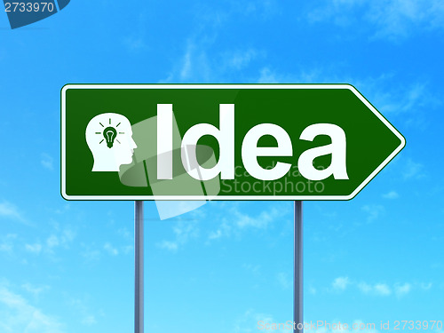 Image of Marketing concept: Idea and Head With Light Bulb on road sign