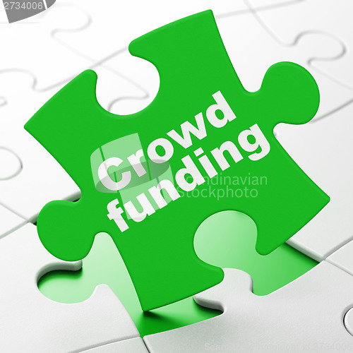 Image of Business concept: Crowd Funding on puzzle background