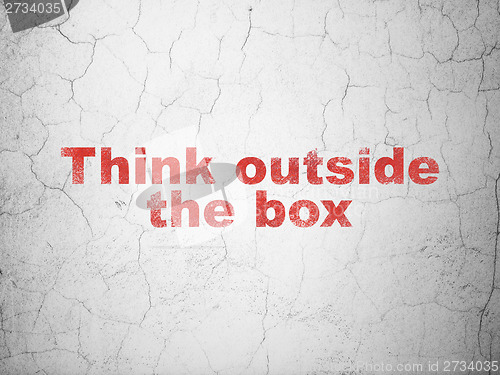 Image of Education concept: Think outside The box on wall background