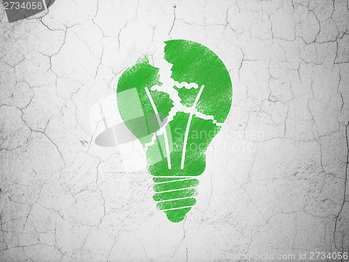 Image of Business concept: Light Bulb on wall background