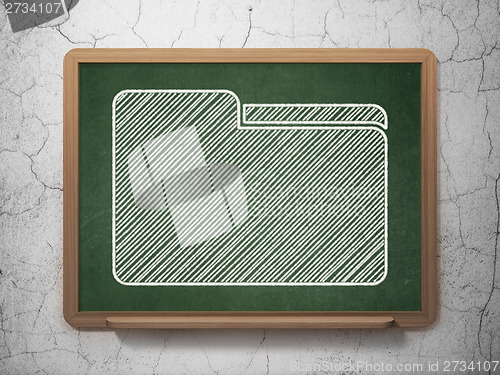 Image of Finance concept: Folder on chalkboard background