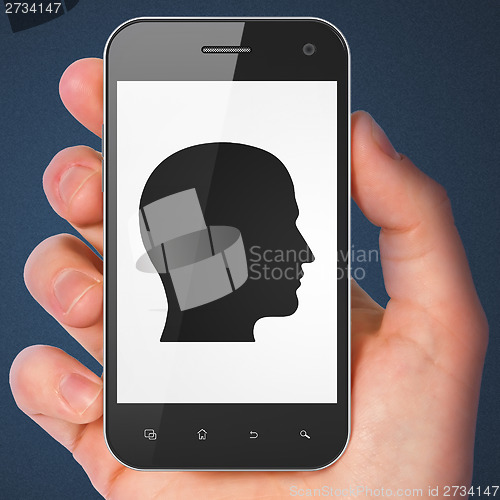 Image of Marketing concept: Head on smartphone