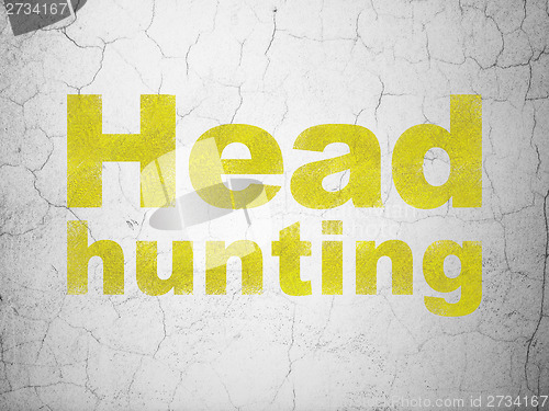 Image of Finance concept: Head Hunting on wall background