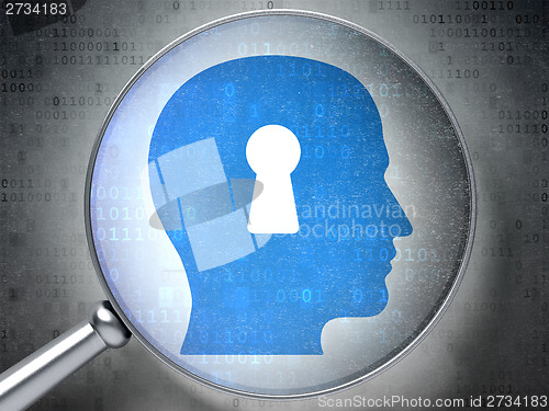 Image of Data concept: Head With Keyhole with optical glass on digital