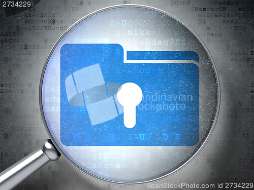 Image of Finance concept: Folder With Keyhole optical glass on digital