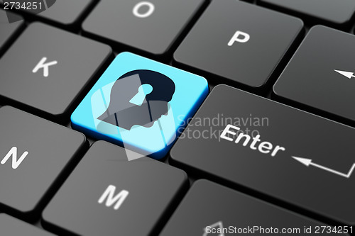 Image of Safety concept: Head With Keyhole on computer keyboard background