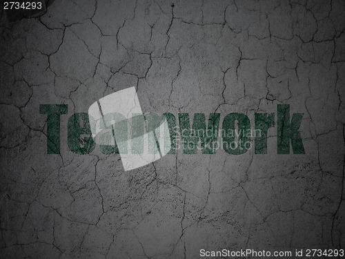 Image of Finance concept: Teamwork on grunge wall background