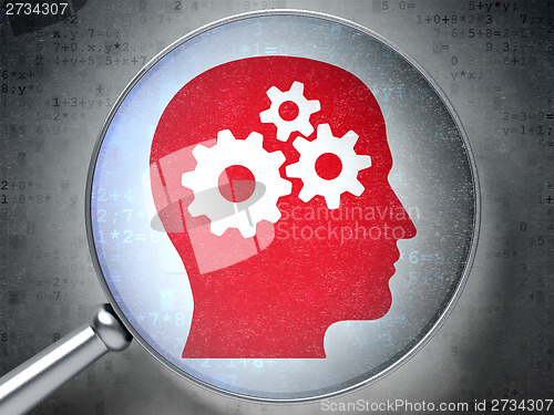 Image of Education concept: Head With Gears with glass on digital