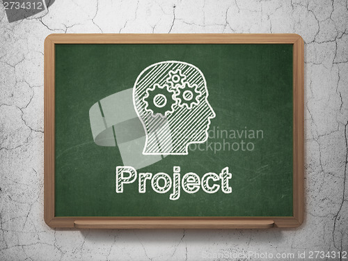 Image of Business concept: Head With Gears and Project on chalkboard