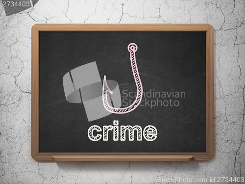 Image of Protection concept: Fishing Hook and Crime on chalkboard background