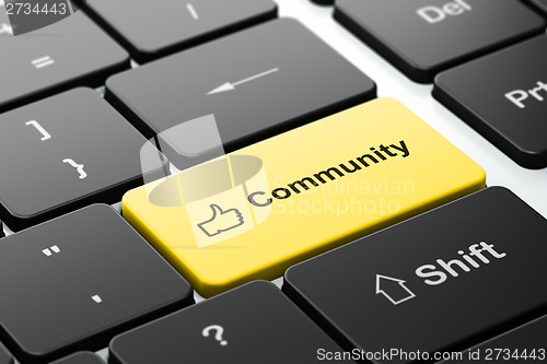 Image of Social network concept: Thumb Up and Community on keyboard