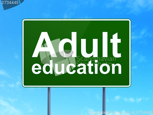 Image of Adult Education on road sign background