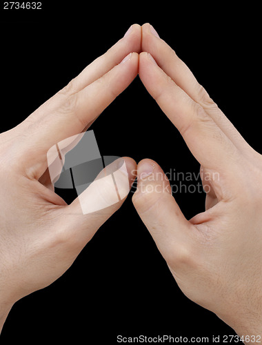 Image of White hand on black