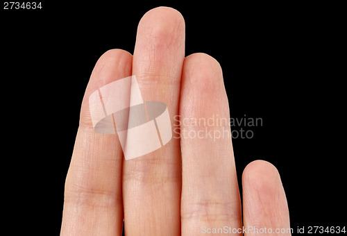 Image of White hand on black