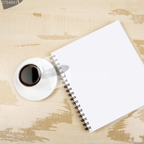 Image of White cup and white page