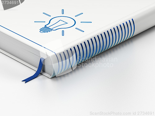 Image of Business concept: closed book, Light Bulb on white background