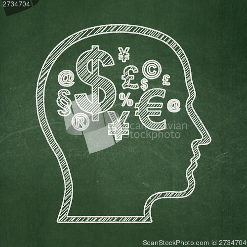 Image of Advertising concept: Head With Finance Symbol on chalkboard