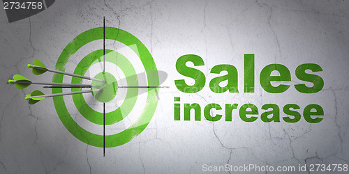 Image of Marketing concept: target and Sales Increase on wall background