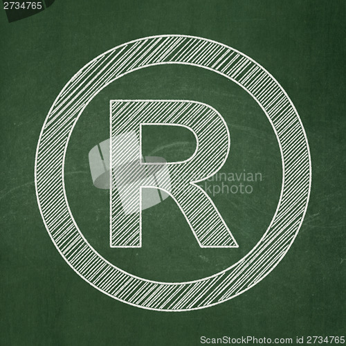 Image of Law concept: Registered on chalkboard background