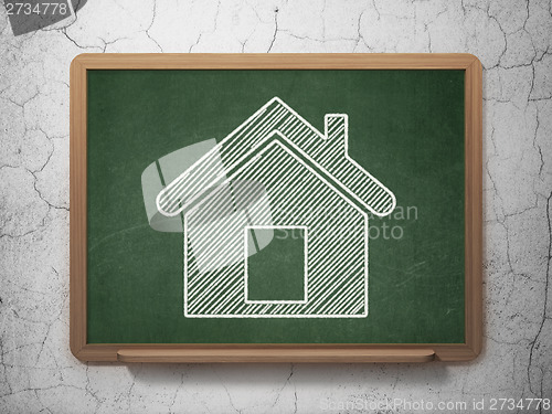 Image of Finance concept: Home on chalkboard background