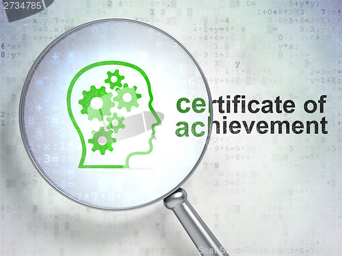 Image of Education concept: Head Gears and Certificate of Achievement