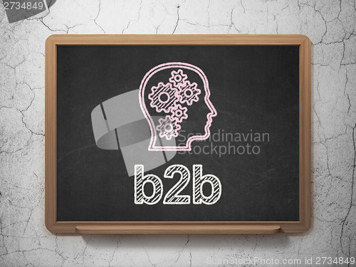 Image of Finance concept: Head With Gears and B2b on chalkboard