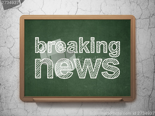 Image of News concept: Breaking News on chalkboard background