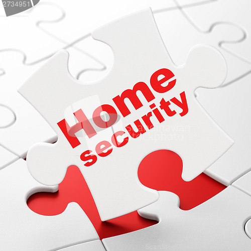 Image of Safety concept: Home Security on puzzle background