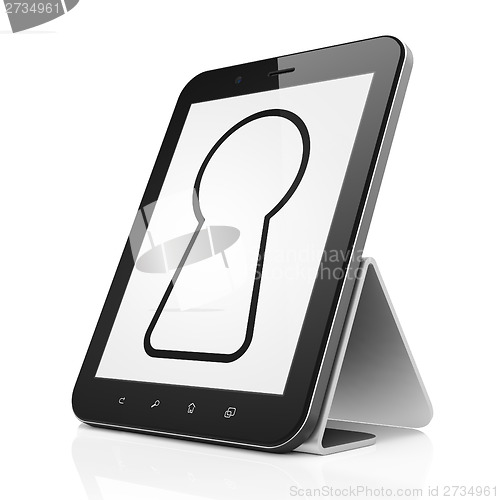 Image of Data concept: Keyhole on tablet pc computer