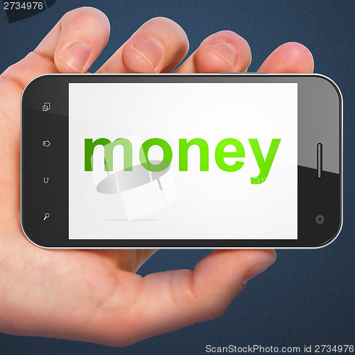 Image of Finance concept: Money on smartphone