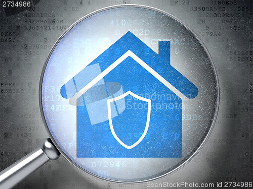 Image of Security concept: Home with optical glass on digital background
