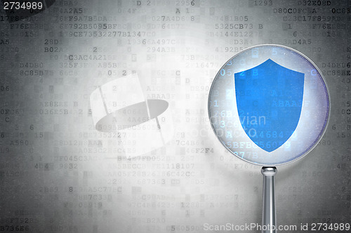 Image of Safety concept:  Shield with optical glass on digital background