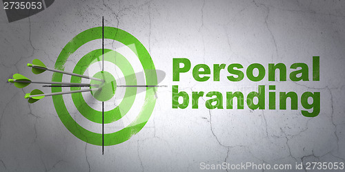 Image of Advertising concept: target and Personal Branding on wall