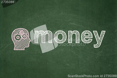 Image of Finance concept: Head With Gears and Money on chalkboard