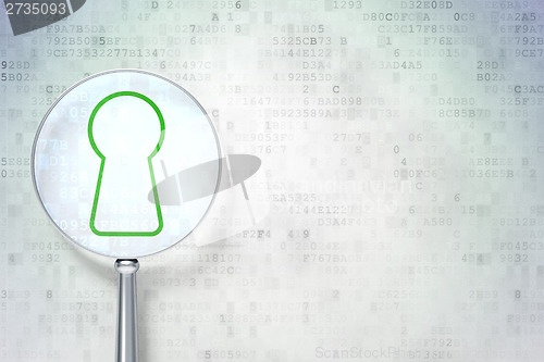 Image of Privacy concept:  Keyhole with optical glass on digital