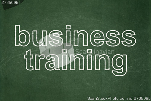 Image of Education concept: Business Training on chalkboard background