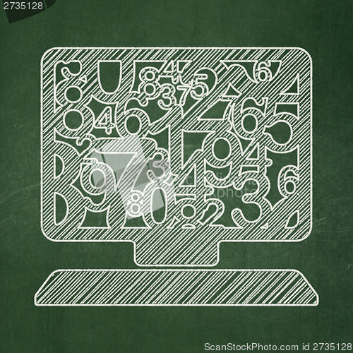 Image of Education concept: Computer Pc on chalkboard background