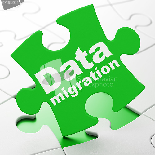 Image of Information concept: Data Migration on puzzle background