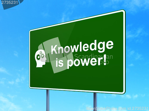 Image of Education concept: Knowledge Is power! and Head With Gears